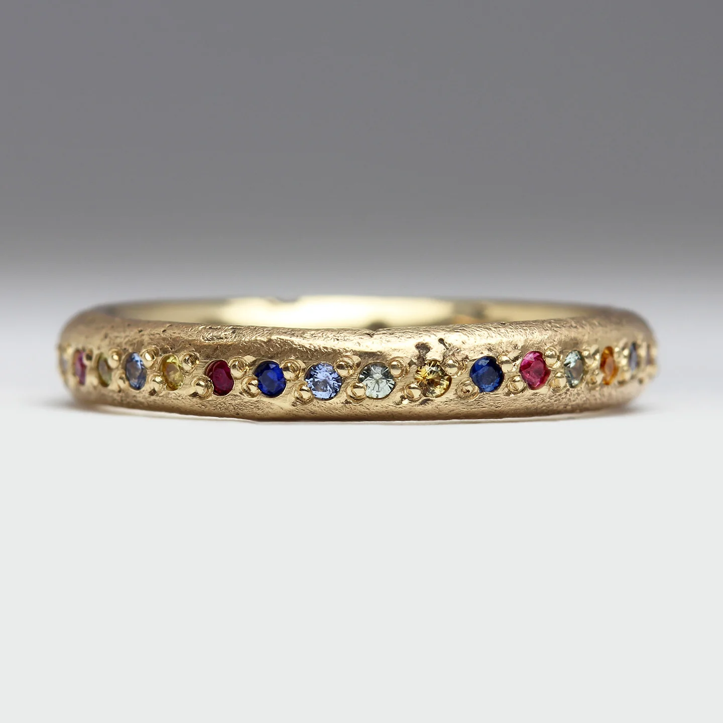 Sandcast Gold Rainbow Eternity Ring - Image 3