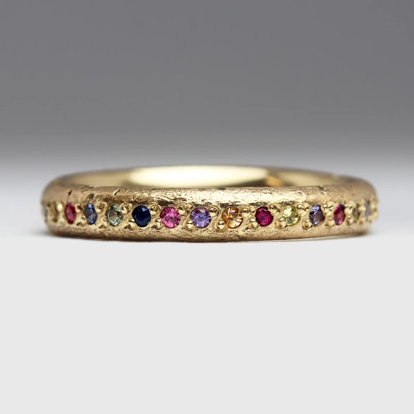 Sandcast Gold Rainbow Eternity Ring - Image 4